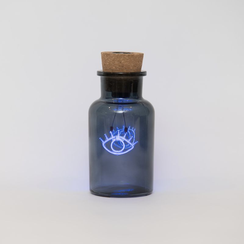 Blue Eye Neon Light in a Glass Bottle
